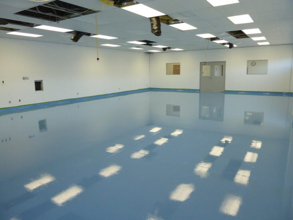 A polyaspartic concrete coating that was dyed blue. Used for a commercial laboratory in Wisconsin for its durability and ease of cleaning and upkeep.