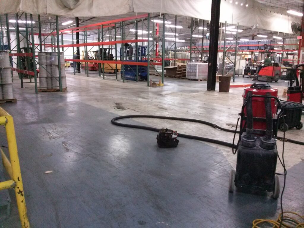 This is a picture of a concrete coating that an industrial facility wanted polished and what the setup looks like before concrete polishing takes place.