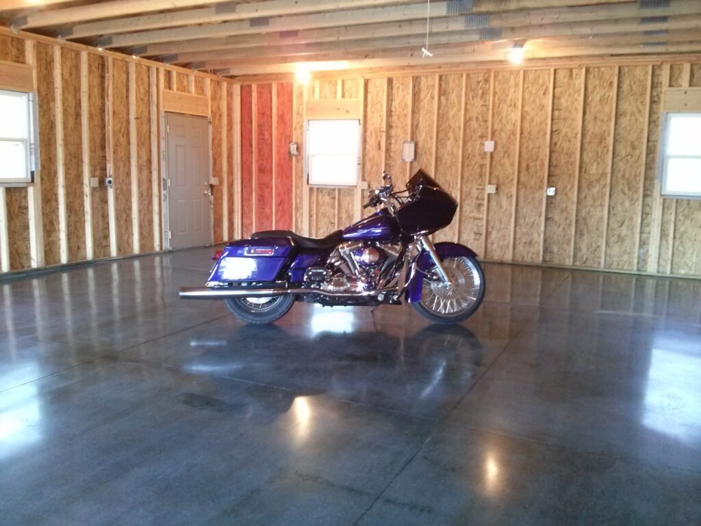Polished concrete floor dyed gray for use as a garage in Wisconsin.