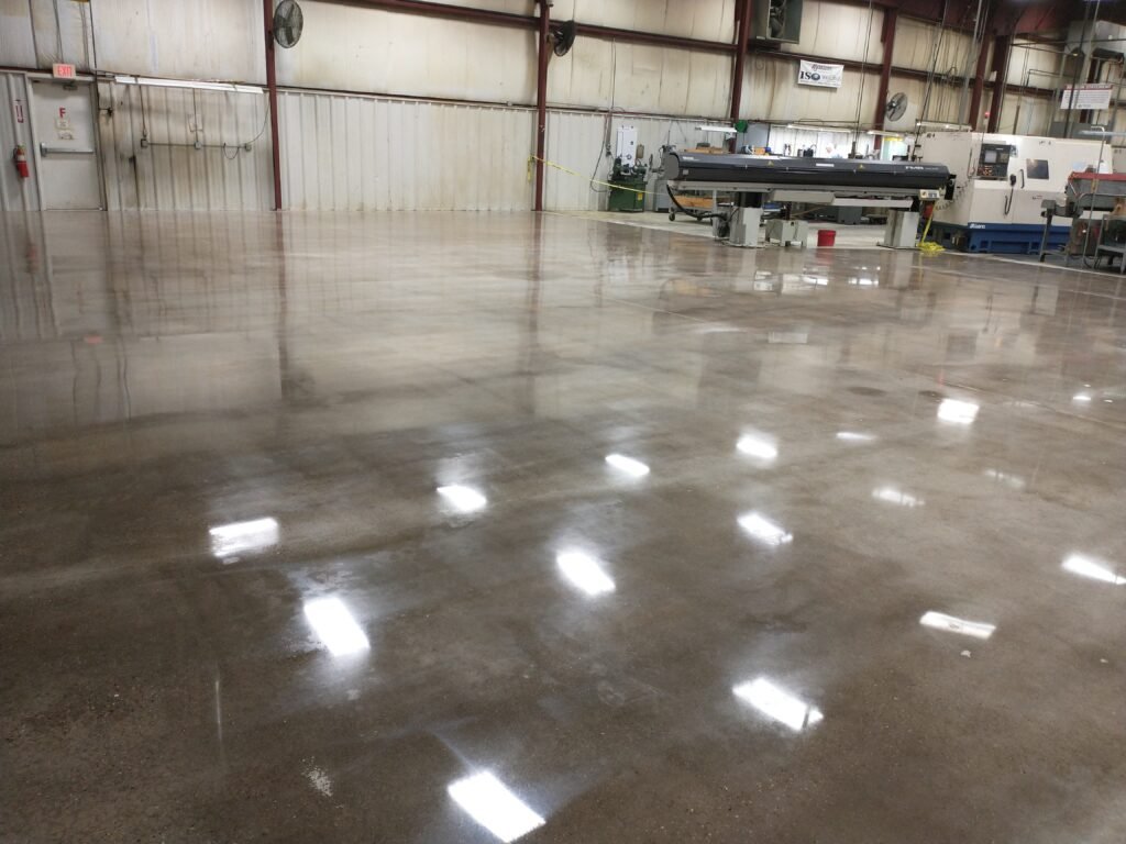 Mid level gloss polished concrete floor completed at a manufacturing plant located in Wisconsin