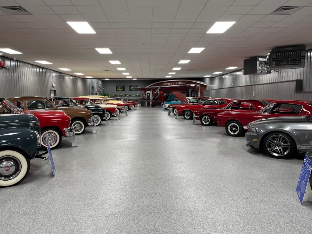 A polyaspartic chip concrete floor installed in a showroom for vehicles based in Wisconsin.