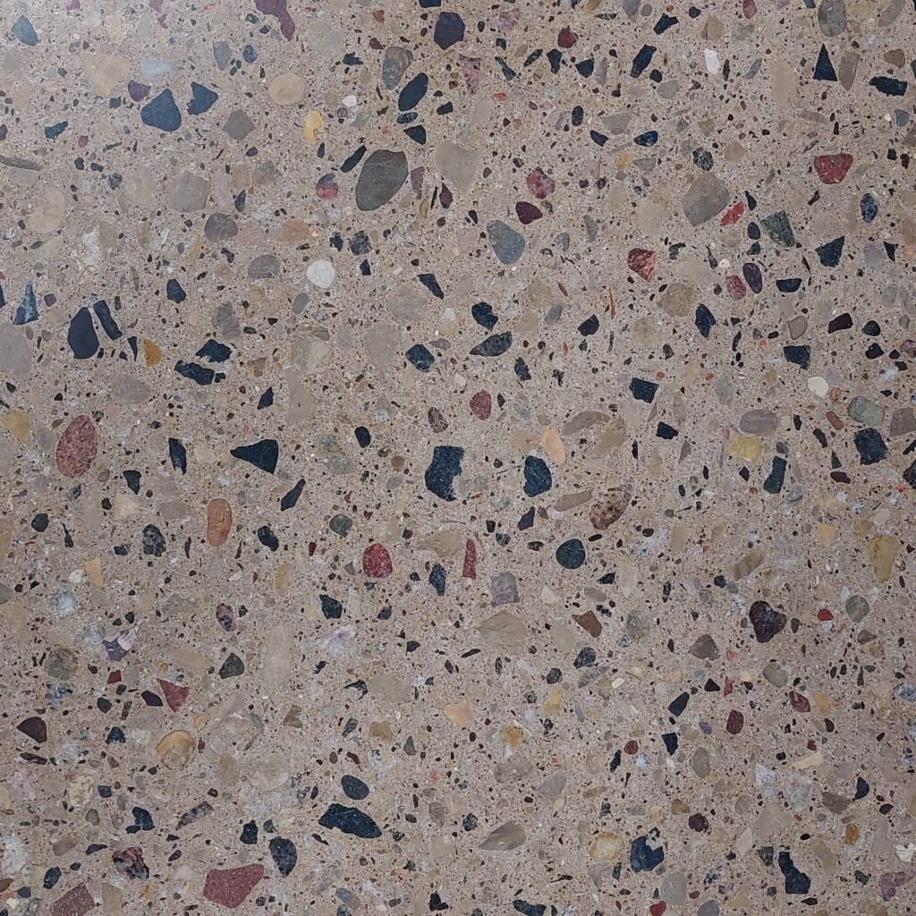 Close up of a polished concrete floor showing exposed aggregate in a medium exposure.