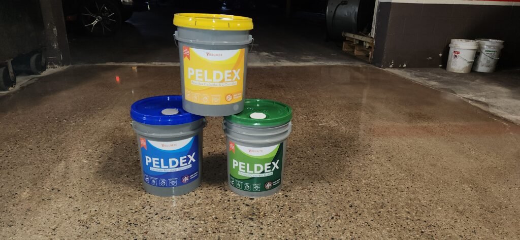 Concrete sealing products sitting on a polished concrete floor that has just been sealed in Wisconsin.