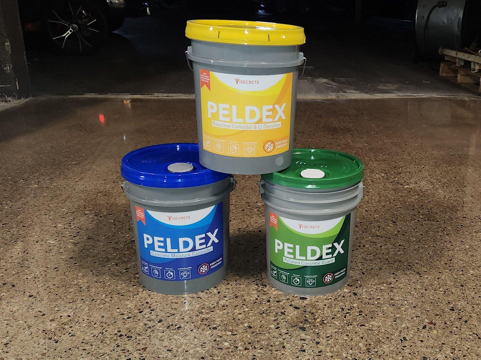 Concrete sealing products sitting on a polished concrete floor that has just been sealed in Wisconsin.