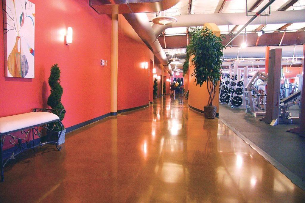 A dyed polished concrete floor that is showing how lobbies and main walkways look great with specialty flooring like dyed concrete floors or terrazzo floors.